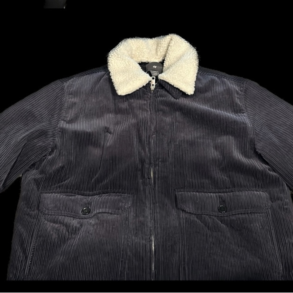 Blue fairy material H&M jacket great for the mountains- worn Once